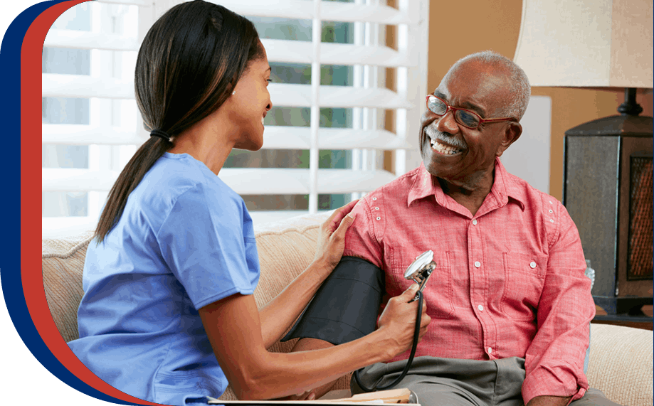 Caregiver nurse visiting senior male patient